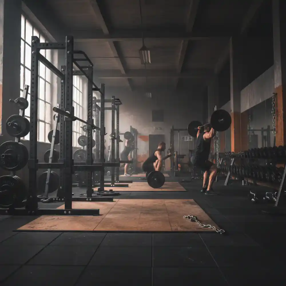 Wide shot of IronBase Gym heavy lifting environment